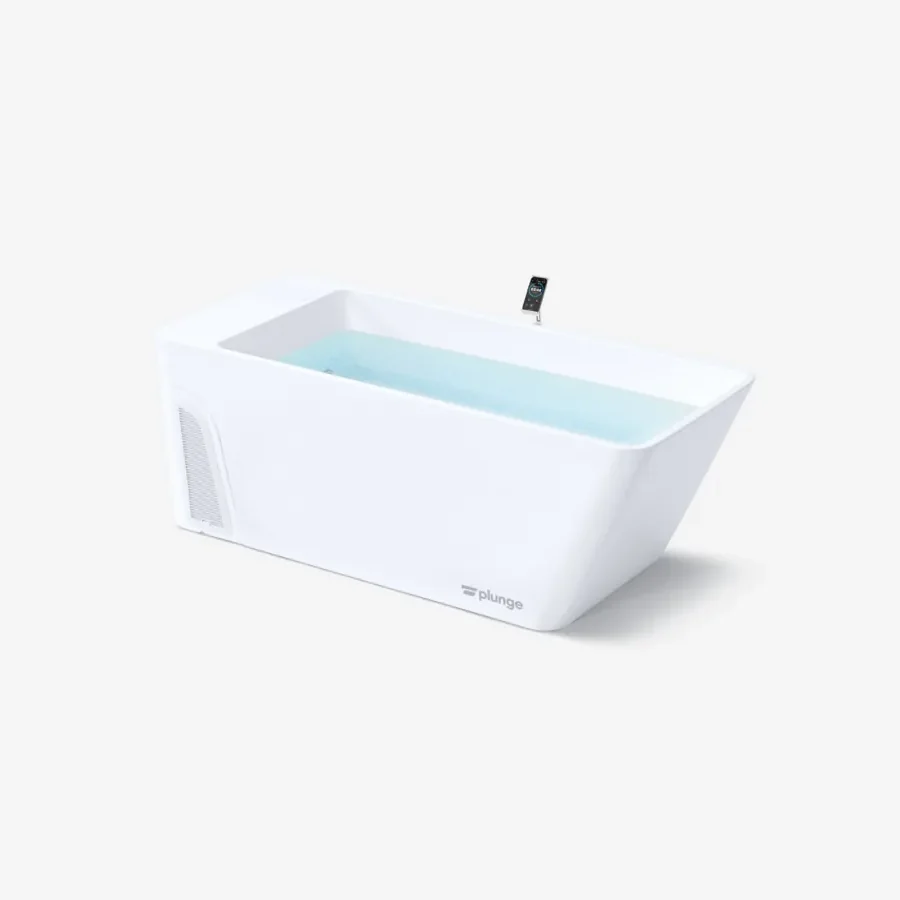 The Plunge All-In, a white moulded rectangular cold plunge tub filled with water, with the integrated chiller housed in the end of the shell